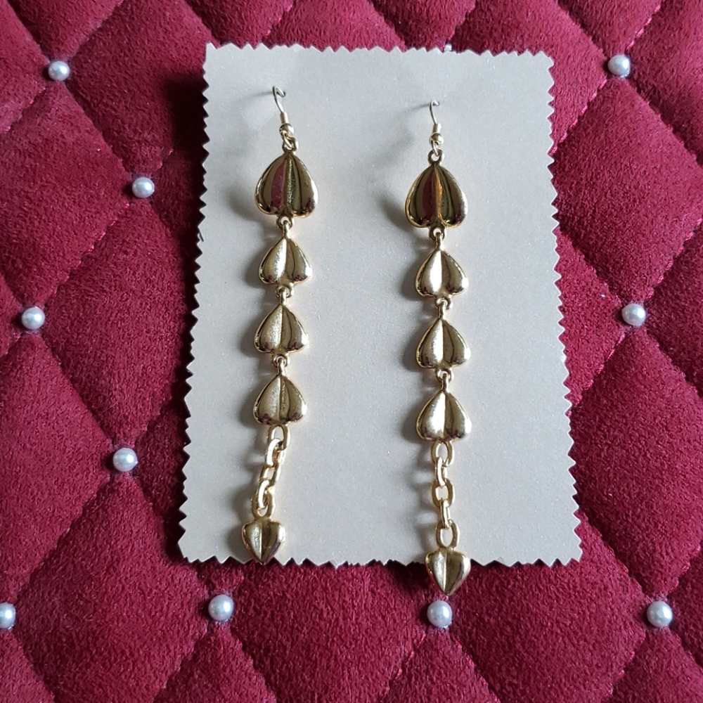 Gold tone dangling earrings